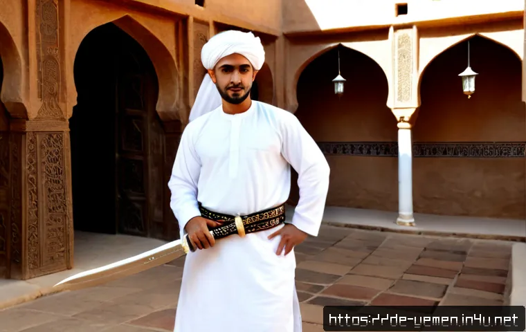 예멘 전통 의상 자나비야 Janbiya - Photorealistic full-length portrait of an adult Yemeni man wearing traditional white thawb, patterne...